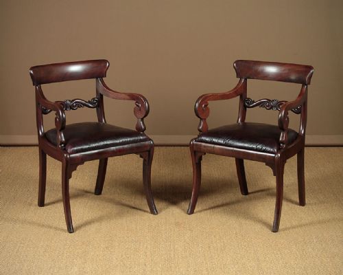 Pair of Regency Sabre Leg Armchairs C.1830.