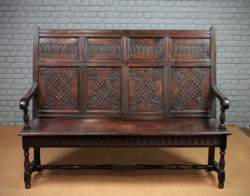 Carved Oak Settle C.1890.