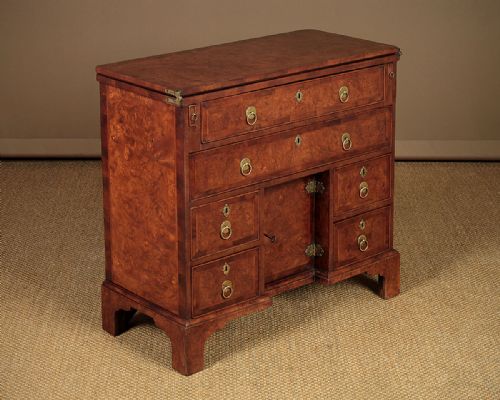 Small Queen Anne Style Walnut Kneehole Desk C.1890.
