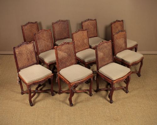 Set of 10 Walnut & Bergere Dining Chairs C.1910.