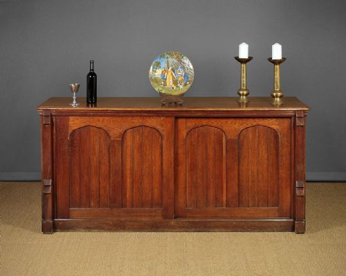 Gothic Oak Cabinet with Sliding Doors C.1900.