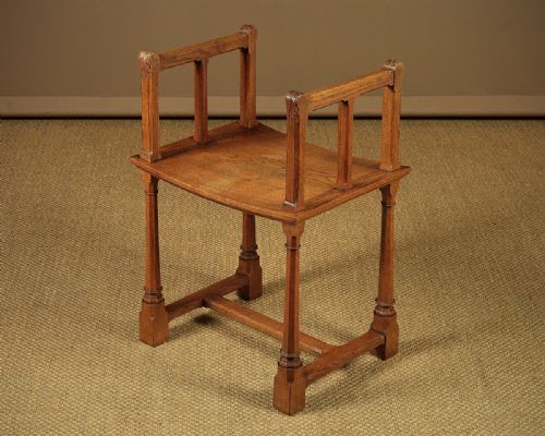 Gothic Oak Stool with Arms C.1910.