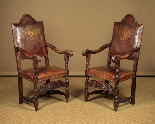 Pair of Armorial Leather Armchairs C.1900.