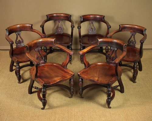 Set of Six Large Saddle Seat Armchairs C.1880.