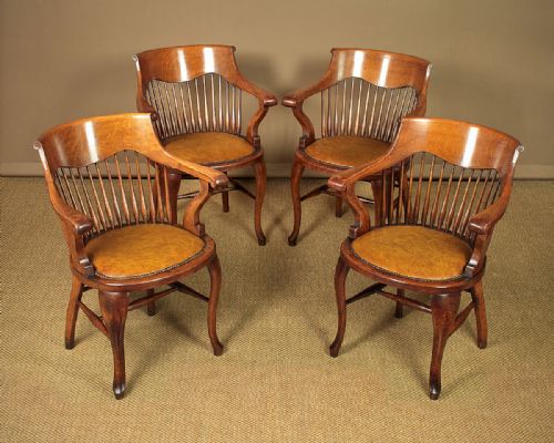 Four Edwardian Oak Office Type Armchairs C.1910.