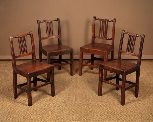 Four Welsh Oak Cottage Dining Chairs C.1850.