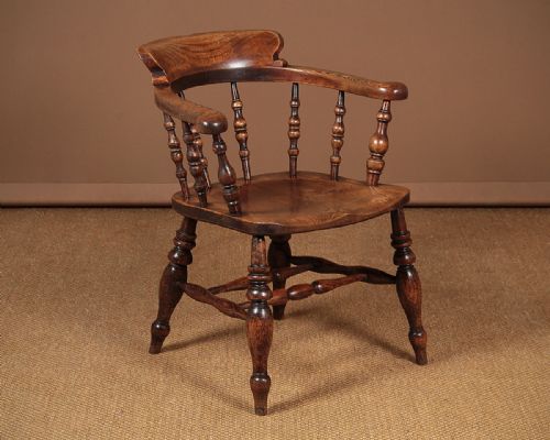 Elm Smoker’s Bow Armchair C.1880.