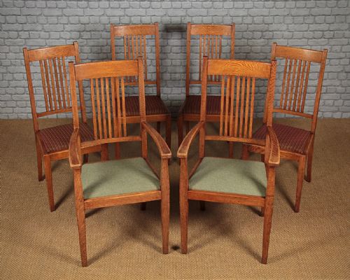 Six Pale Oak Dining Chairs C.1910.