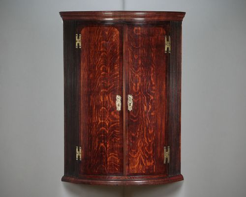 Oak & Mahogany Bow Front Corner Cupboard C.1800.