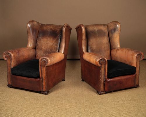 Pair of Leather Armchairs C.1930.