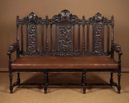 Large Carved Oak Settle C.1880.