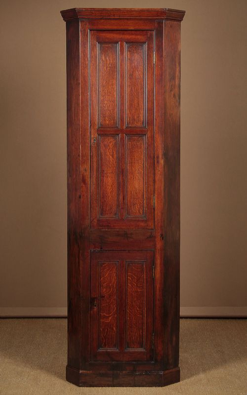 Very Narrow Oak Corner Cupboard C.1820.