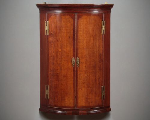 Oak & Mahogany Bow Front Corner Cupboard C.1810.