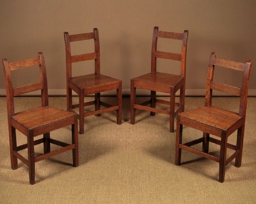 Four Welsh Oak Cottage Dining Chairs C.1850.