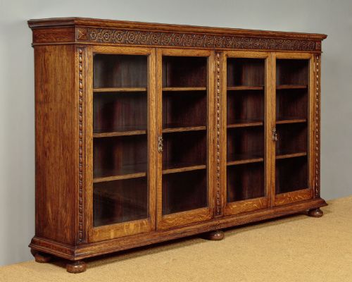 Long Carved Oak Bookcase by Gardners of Glasgow C.1910