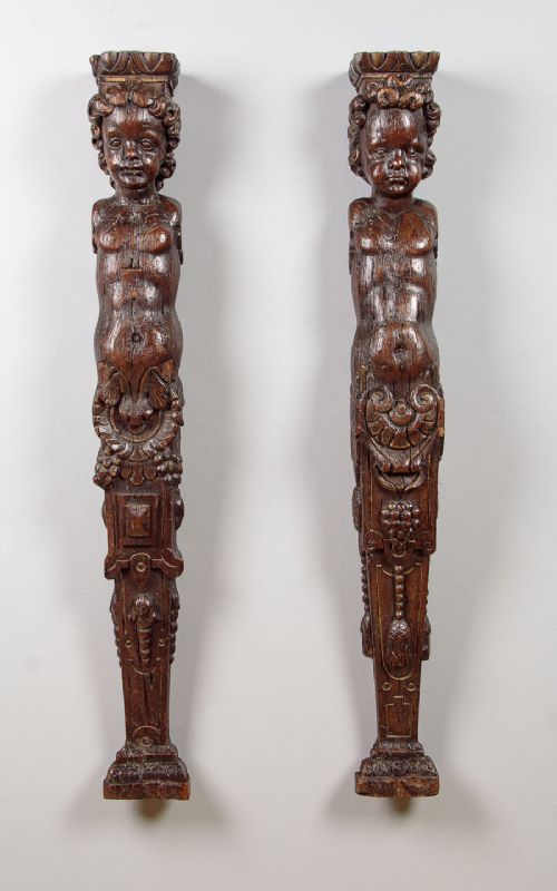 Two 17th. Carved Oak Putti Corbels