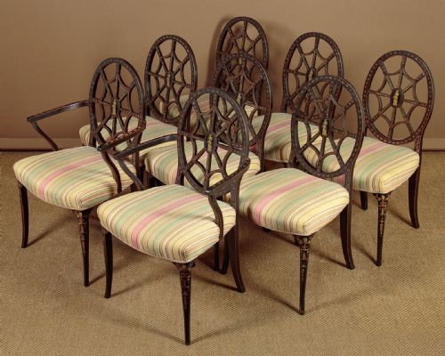 Set of 8 Ebonised and Painted Spider Back Dining Chairs C.1930
