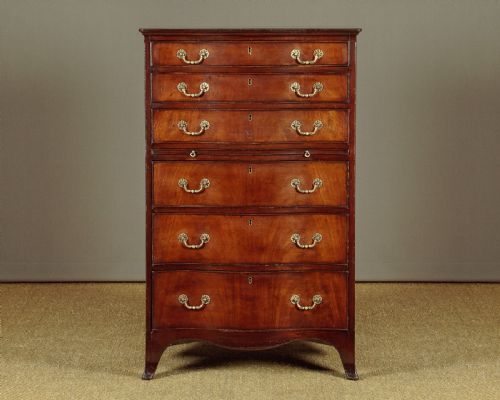 Tall Serpentine Front Chest of Drawers C.1930