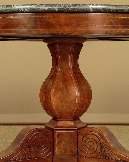 A 19th-century circular gueridon centre table featuring a dark grey marble top, warm walnut veneer with string inlay, a bulbous pedestal, and carved paw feet. View VII