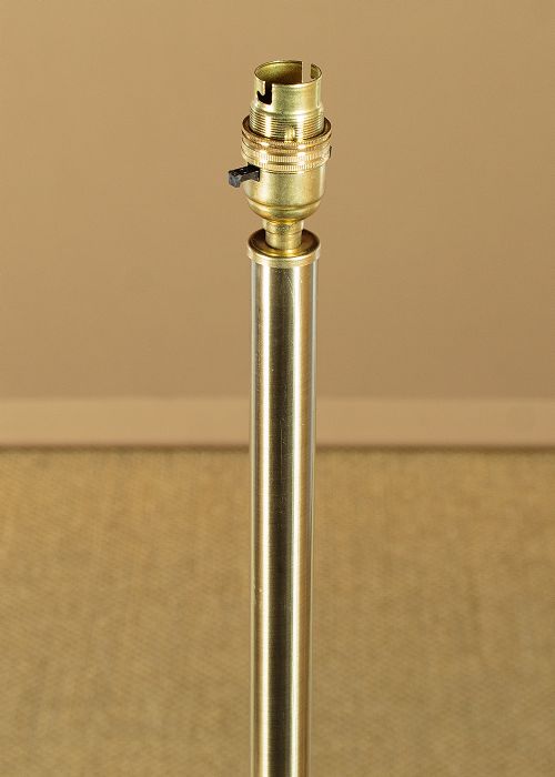 An Edwardian brass standard lamp featuring an integrated circular onyx wine table with a pierced gallery trim atop a scrolling tripod base. View III