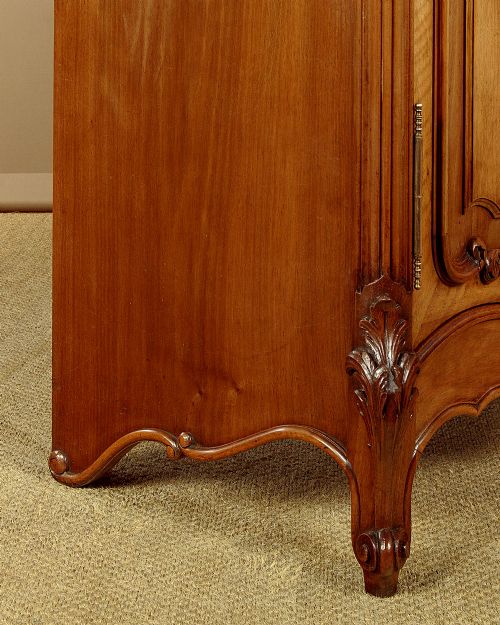 A French walnut sideboard featuring three top drawers, three panelled cabinet doors with central carved fruit motifs, brass handles, cabriole legs, and a fitted dark marble top. View XIV