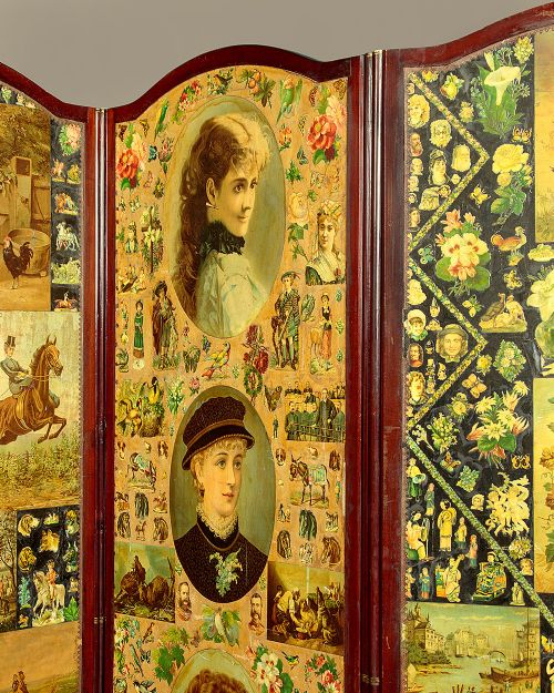 A late Victorian three-panel wooden folding screen covered in dense decoupage scrapwork featuring portraits, animals, and floral imagery. View V