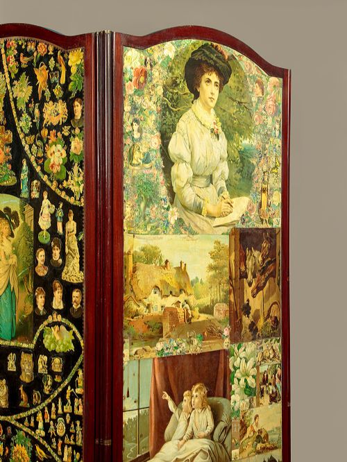 A late Victorian three-panel wooden folding screen covered in dense decoupage scrapwork featuring portraits, animals, and floral imagery. View VI
