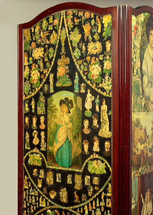 A late Victorian three-panel wooden folding screen covered in dense decoupage scrapwork featuring portraits, animals, and floral imagery. View VII