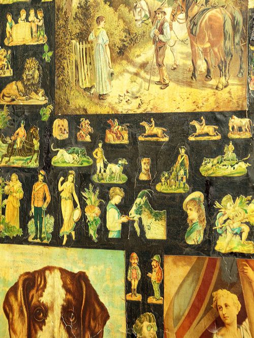 A late Victorian three-panel wooden folding screen covered in dense decoupage scrapwork featuring portraits, animals, and floral imagery. View XI