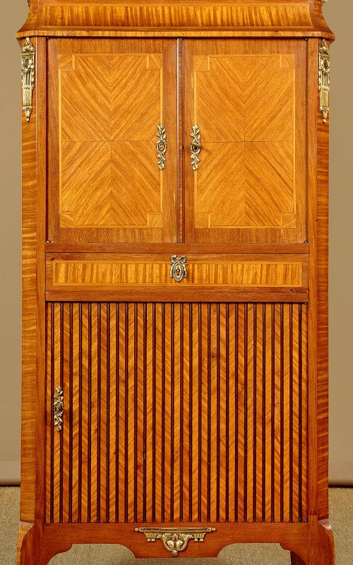 A tall Louis XVI style wooden side cabinet featuring geometric herringbone parquetry veneers, brass mounts, and a polished marble top. View VII