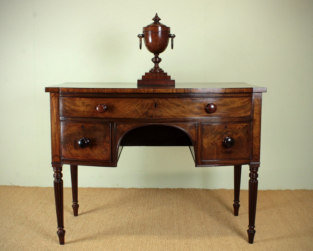 Small Bow Front Mahogany Sideboard. c.1820.