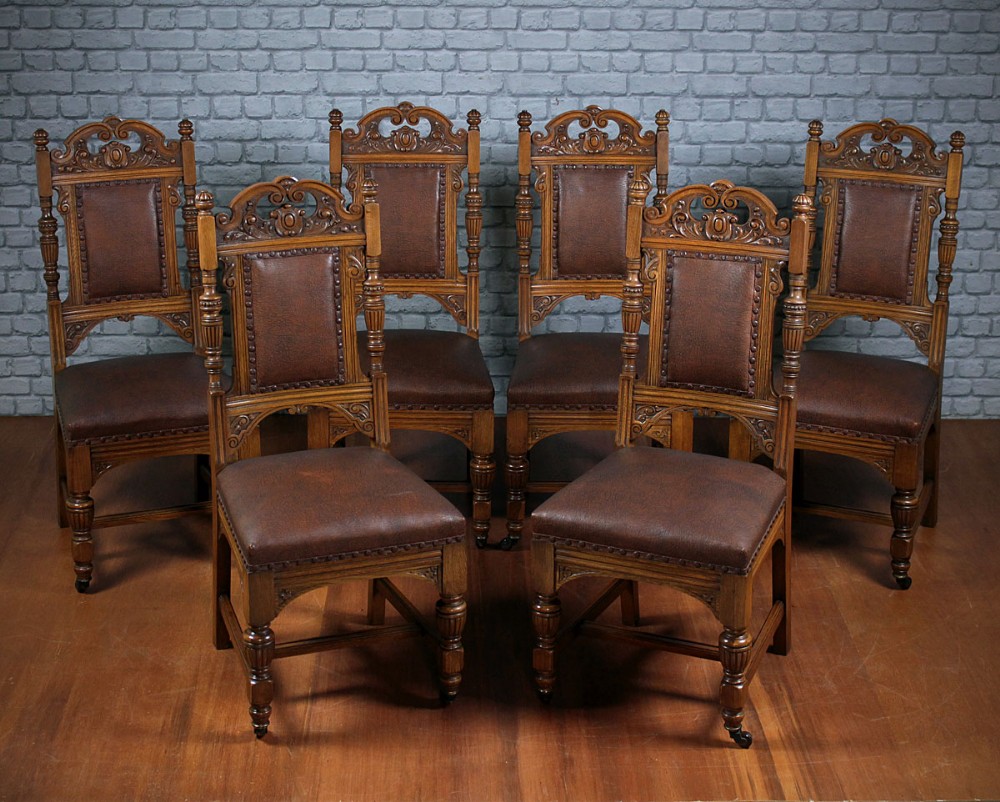 Six Carved Oak Dining Chairs c.1880.