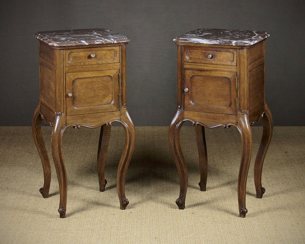 Pair of French Marble Top Oak Bedside Cabinets c.1920.
