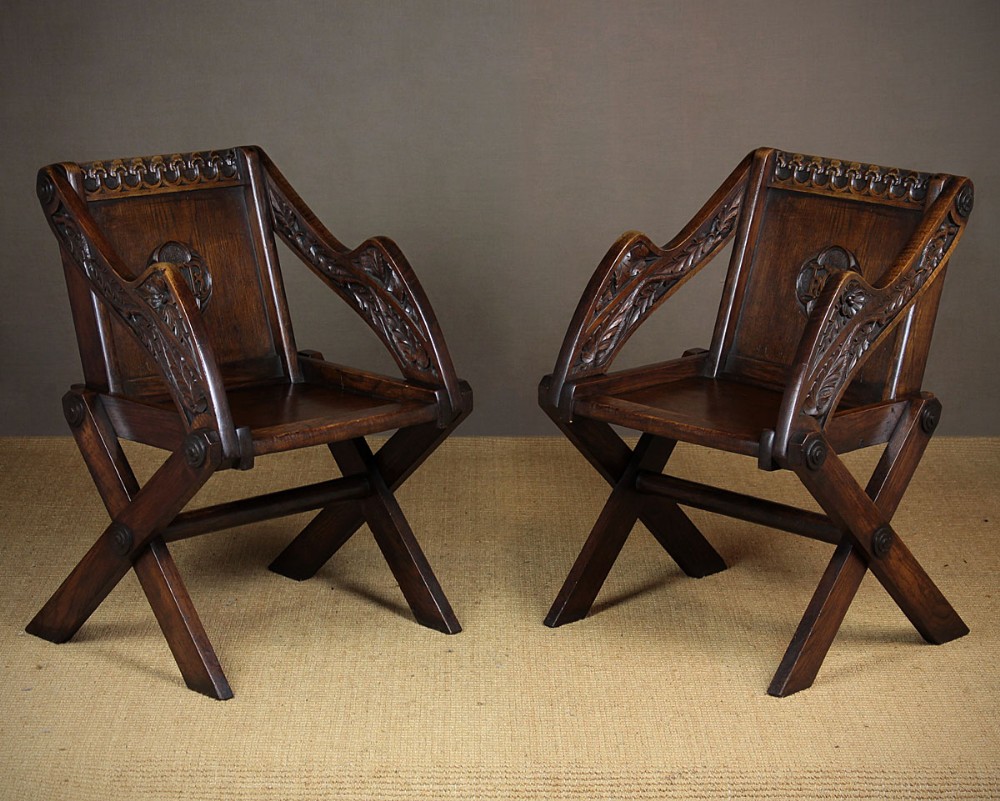Pair of Carved Oak Glastonbury Chairs c.1890.