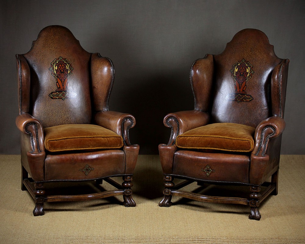 Pair Large Leather Armchairs with Painted Lions c.1910.