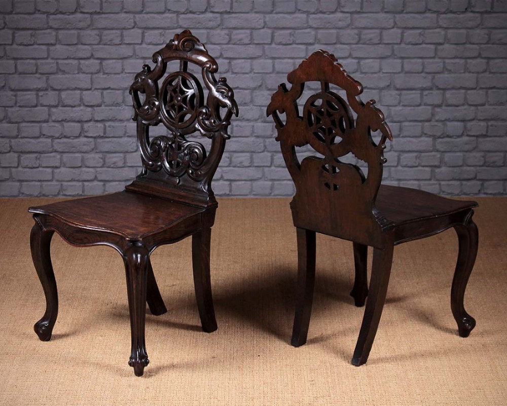 Pair Oak Hall Chairs with Peacock’s Head Carvings c.1860.