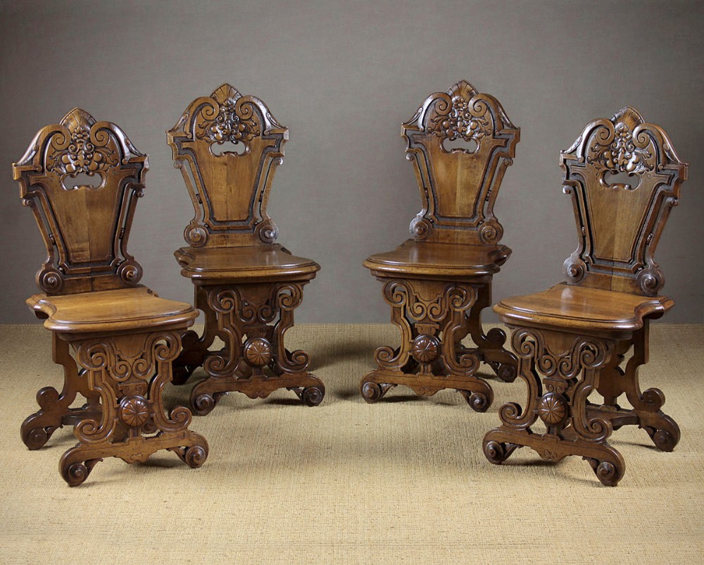 Four Carved Walnut Chairs c.1880