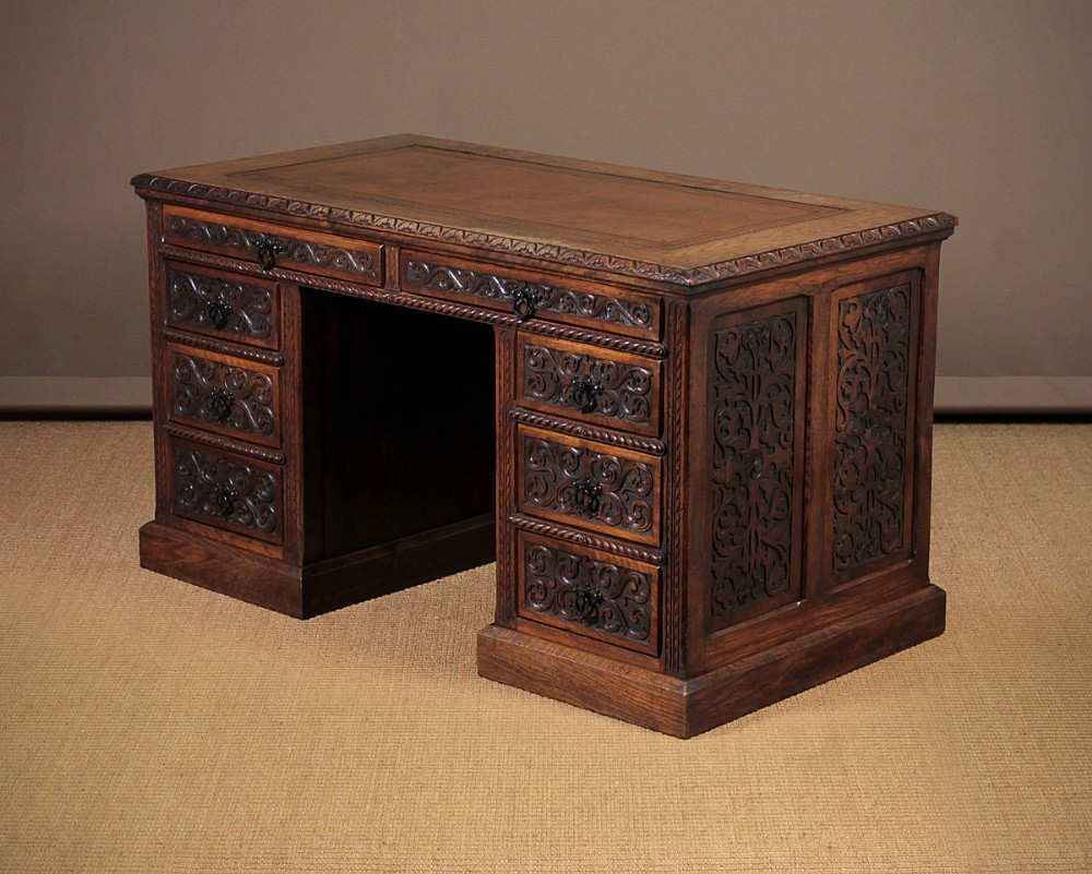 Carved Oak & Walnut Kneehole Desk c.1870.