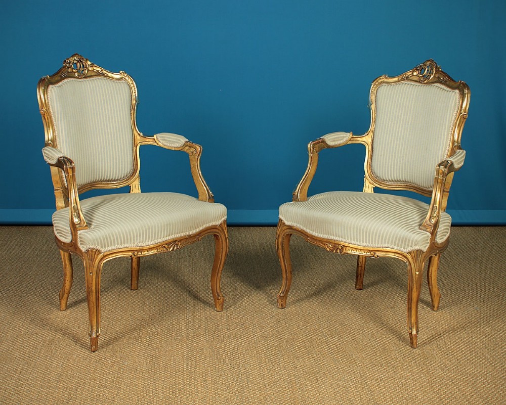 Pair of Louis XV Style Giltwood Open Armchairs c.1900.