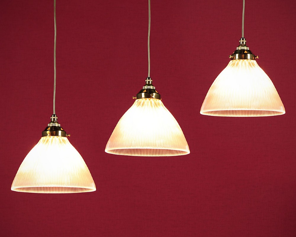Three Pendant Lights with Holophane Shades c.1920.