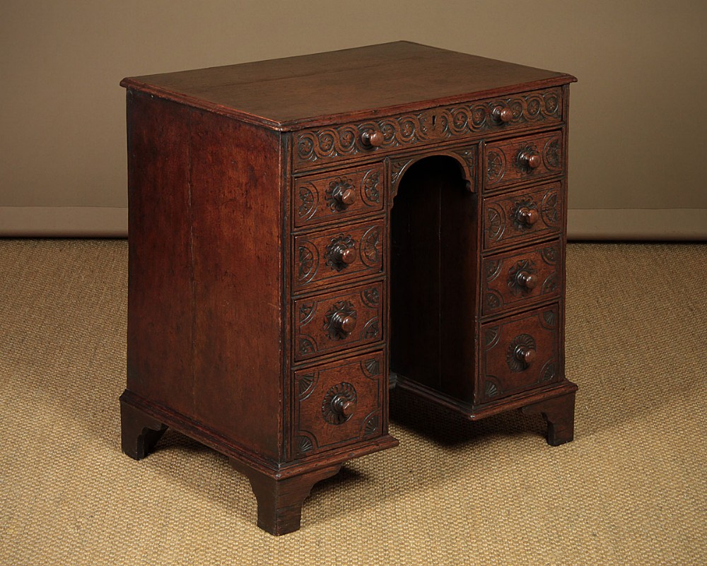 Very Small Carved Oak Kneehole Desk c.1900.