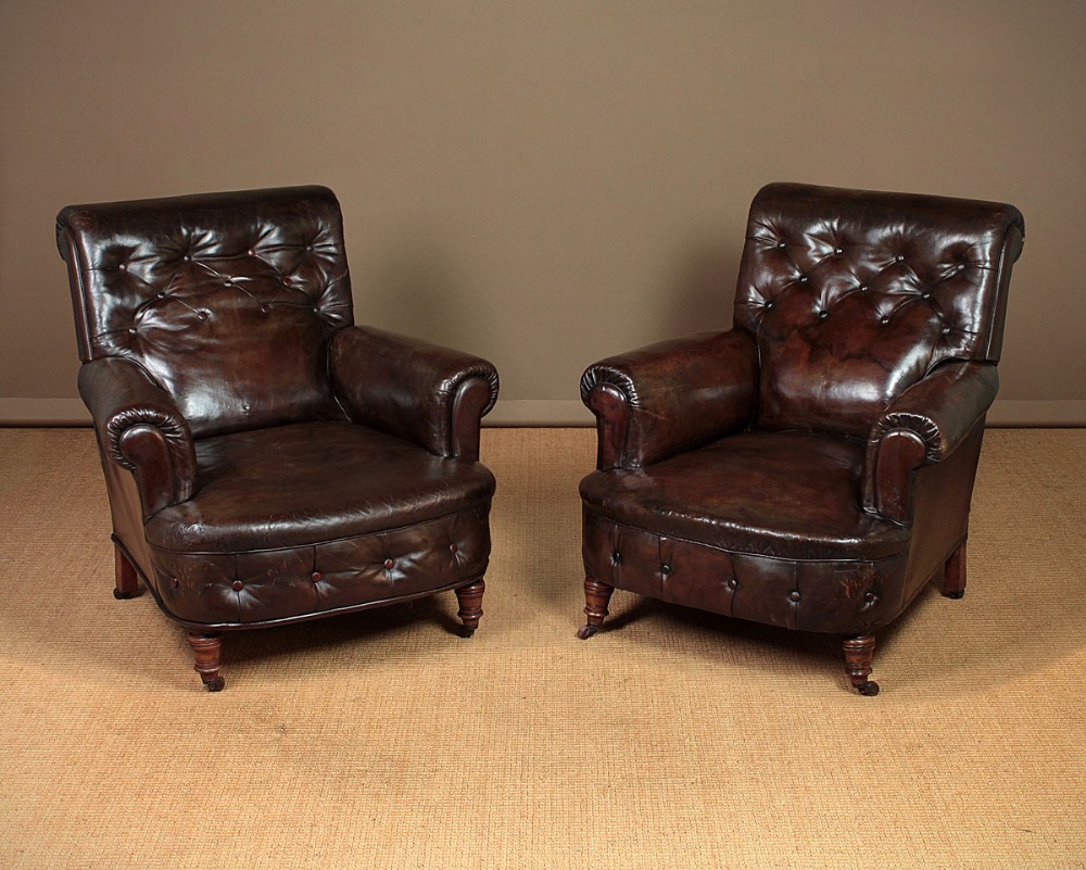 Pair of Buttoned Leather Armchairs c.1900.