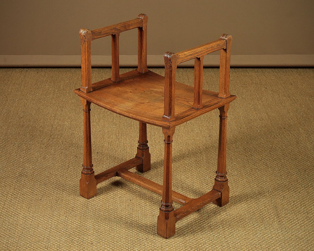 Gothic Oak Stool with Arms c.1910.