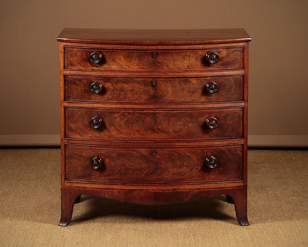 Small Bow Front Mahogany Chest of Drawers c.1835.