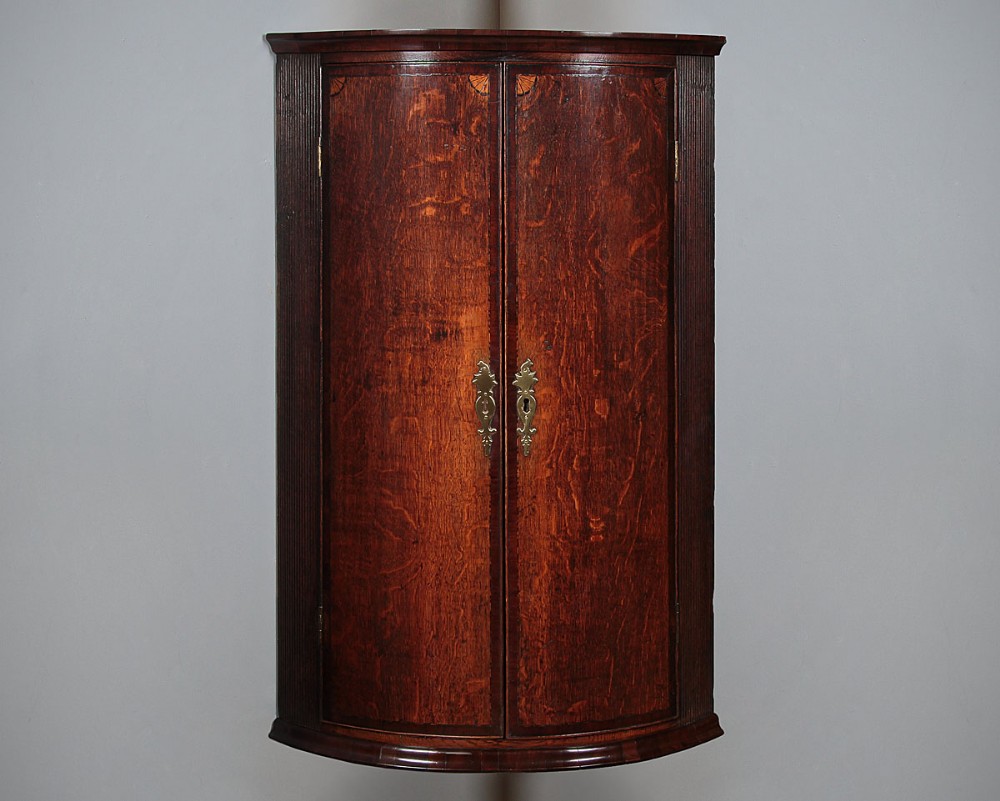 Georgian Oak Bow Front Corner Cupboard c.1790.