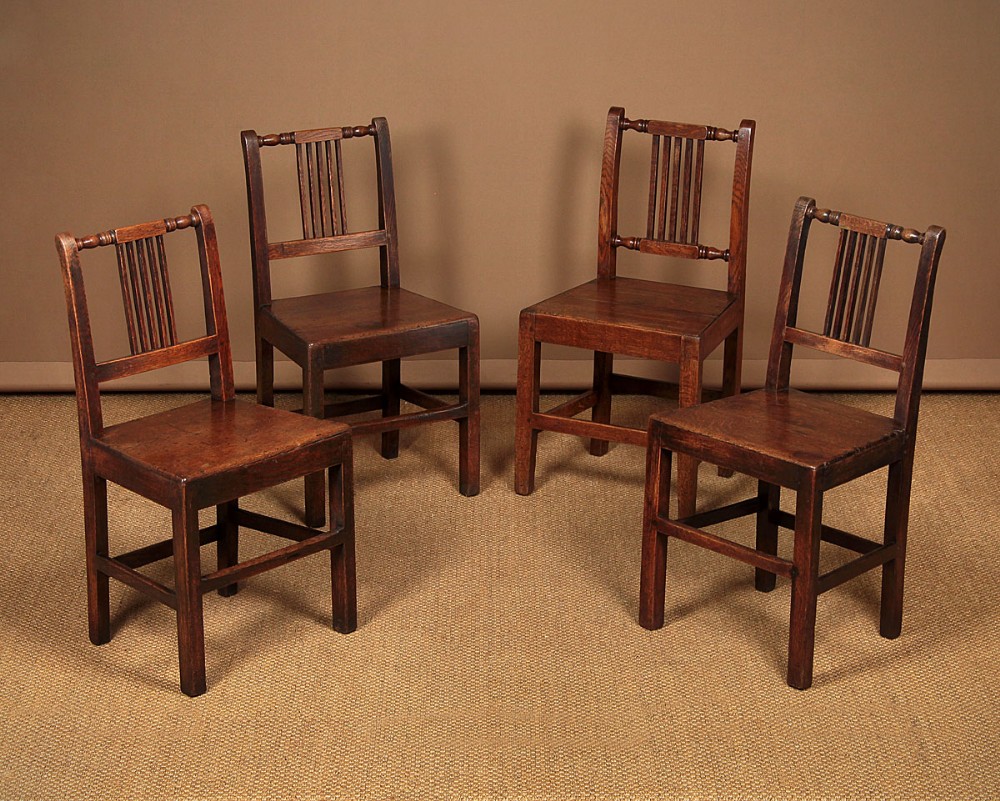 Four Welsh Oak Cottage Dining Chairs c.1850.