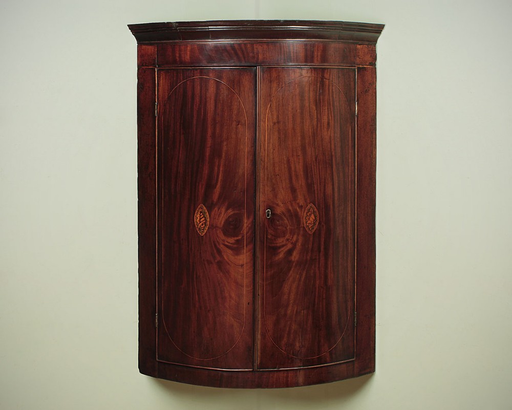 George III Inlaid Bow Front Corner Cupboard c.1810.