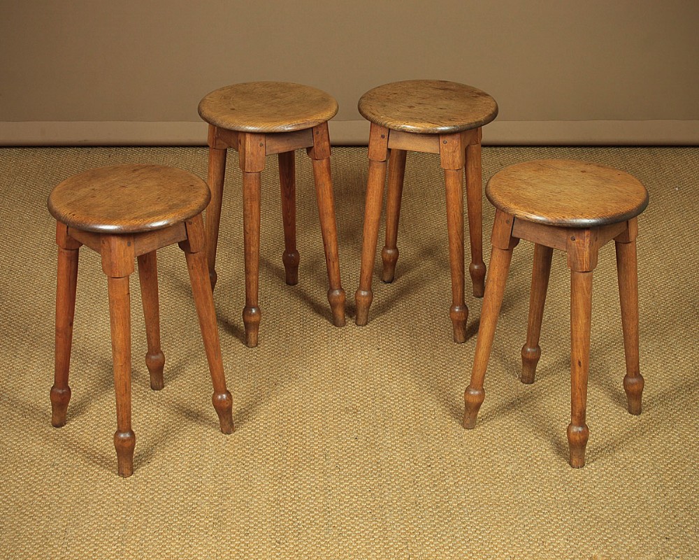 Four Oak Tavern Stools c.1920.