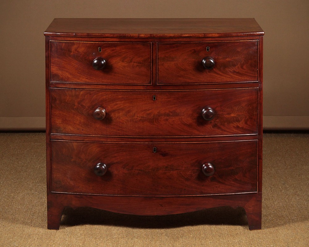 Small Bow Front Mahogany Chest of Drawers c.1830.