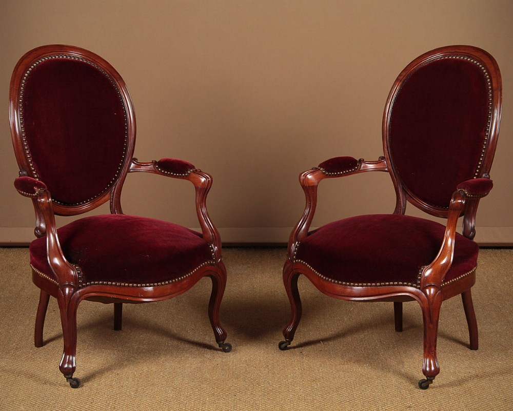 Pair of Walnut Open Armchairs c.1880.
